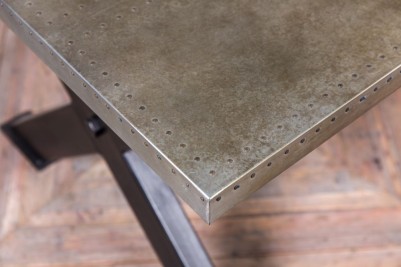 dudley-x-frame-dining-table-zinc-top-close-up